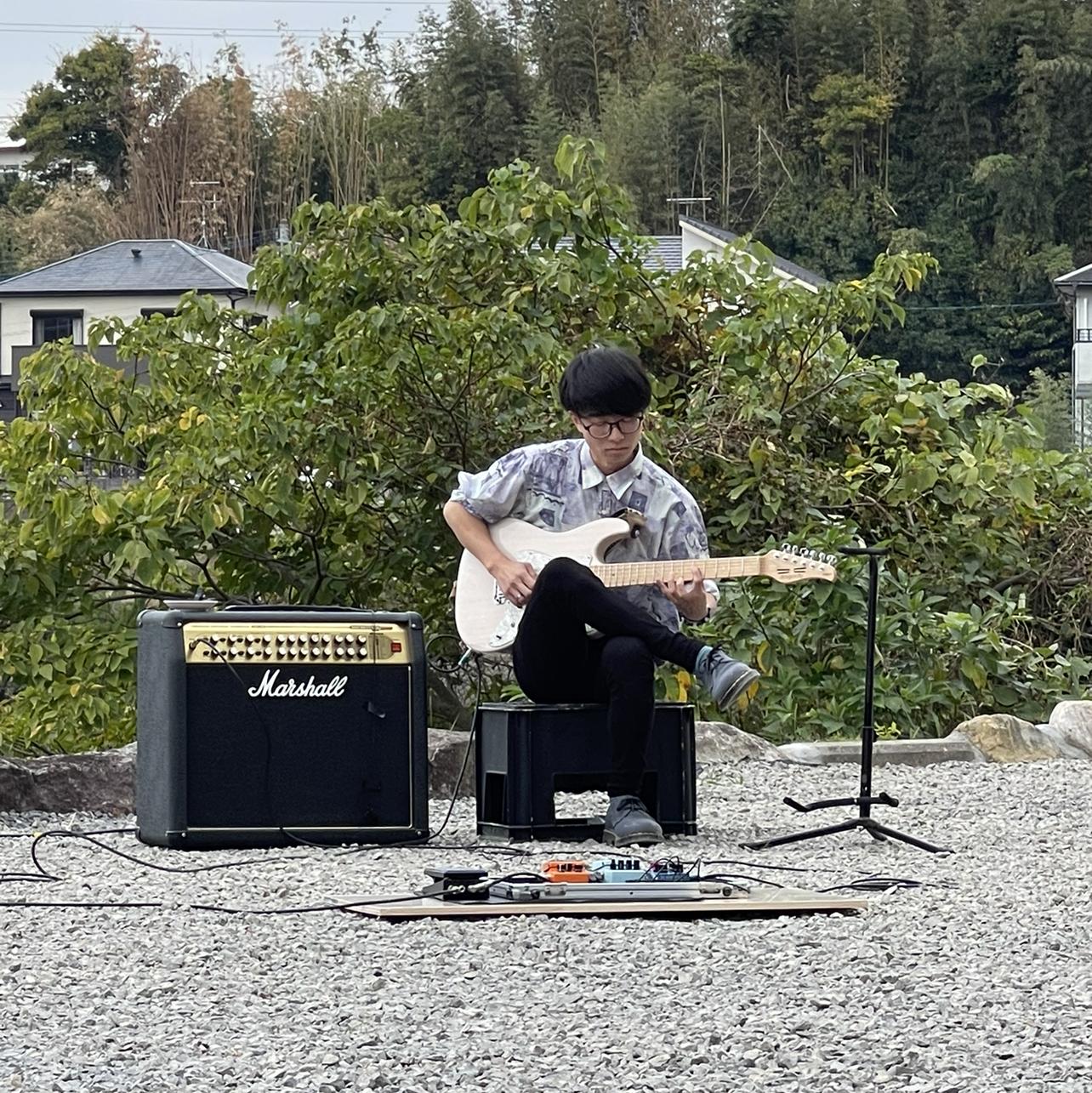 かいしん/ギター教える人の画像